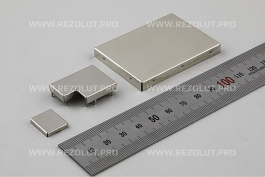 ONE-COMPONENT MOLDED L- AND <br> T-SHAPED RF SHIELDS