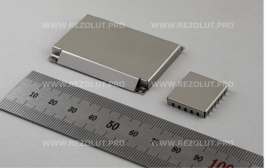TWO-COMPONENT MOLDED RF SHIELDS