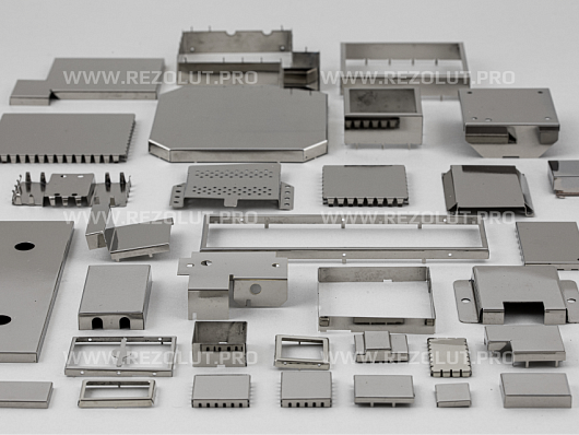 TWO-COMPONENT MOLDED RF SHIELDS