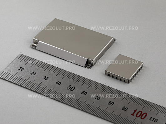 TWO-COMPONENT MOLDED RF SHIELDS