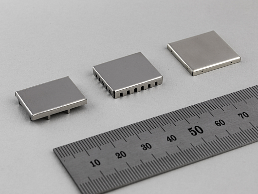TWO-COMPONENT MOLDED RF SHIELDS